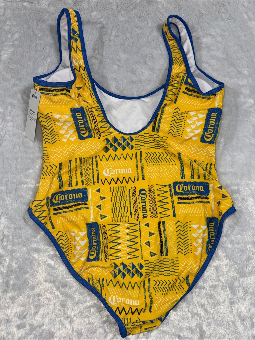 Corona Women One-Piece Swimsuit in White with Blue Trim and Yellow Logo - Picture 7 of 8